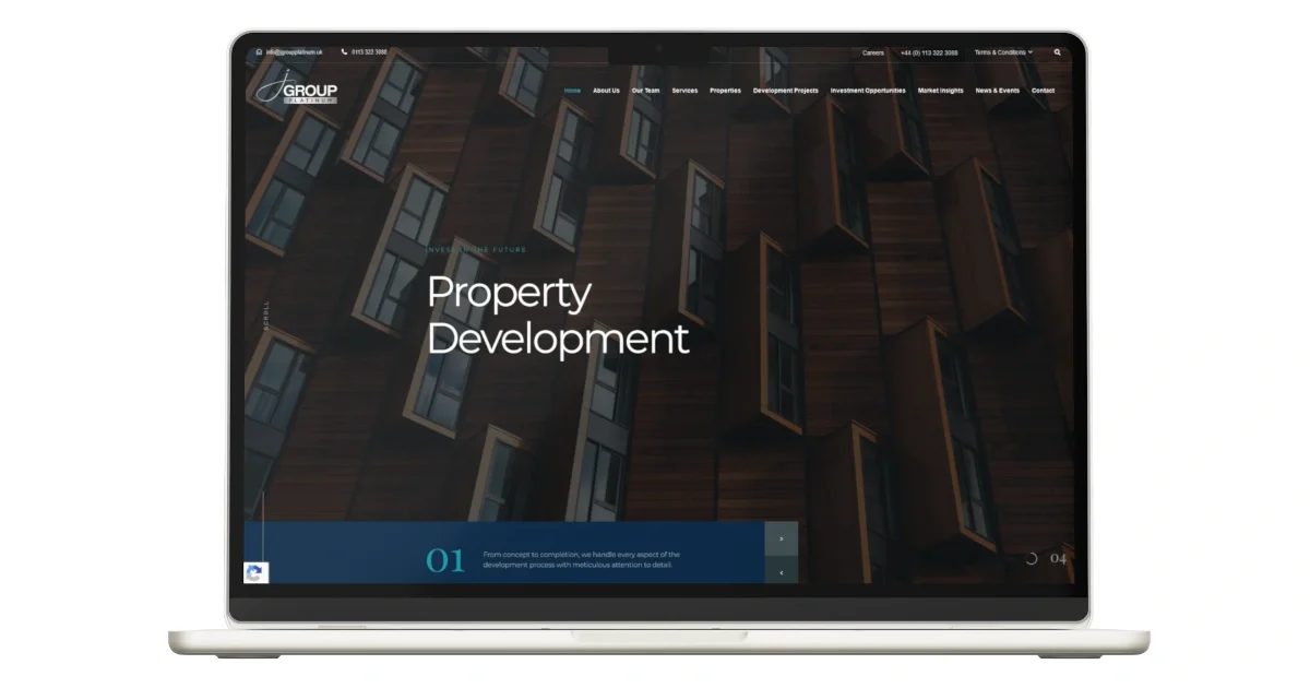 Laptop displaying property development website homepage